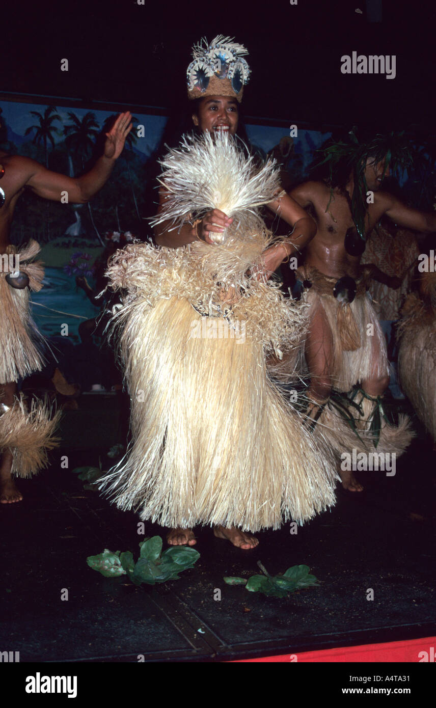 Pretty Tahitian girl dances a to visitors with the traditional