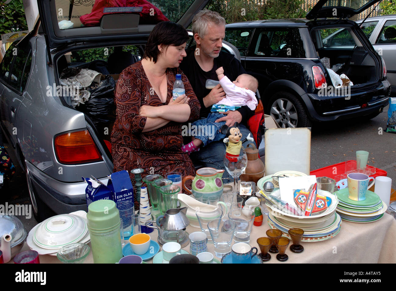 people selling clothes and household goods at a boot sale in South London. Stock Photo