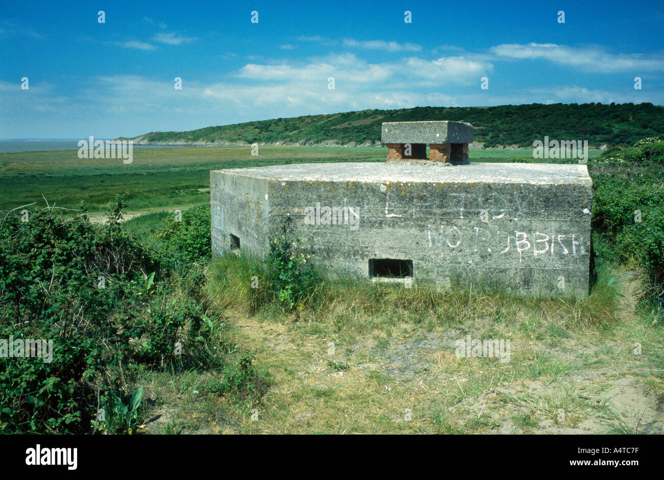 Second World War pillbox at Sand Bay with Sand Point in distance, near Weston super Mare, Somerset Stock Photo