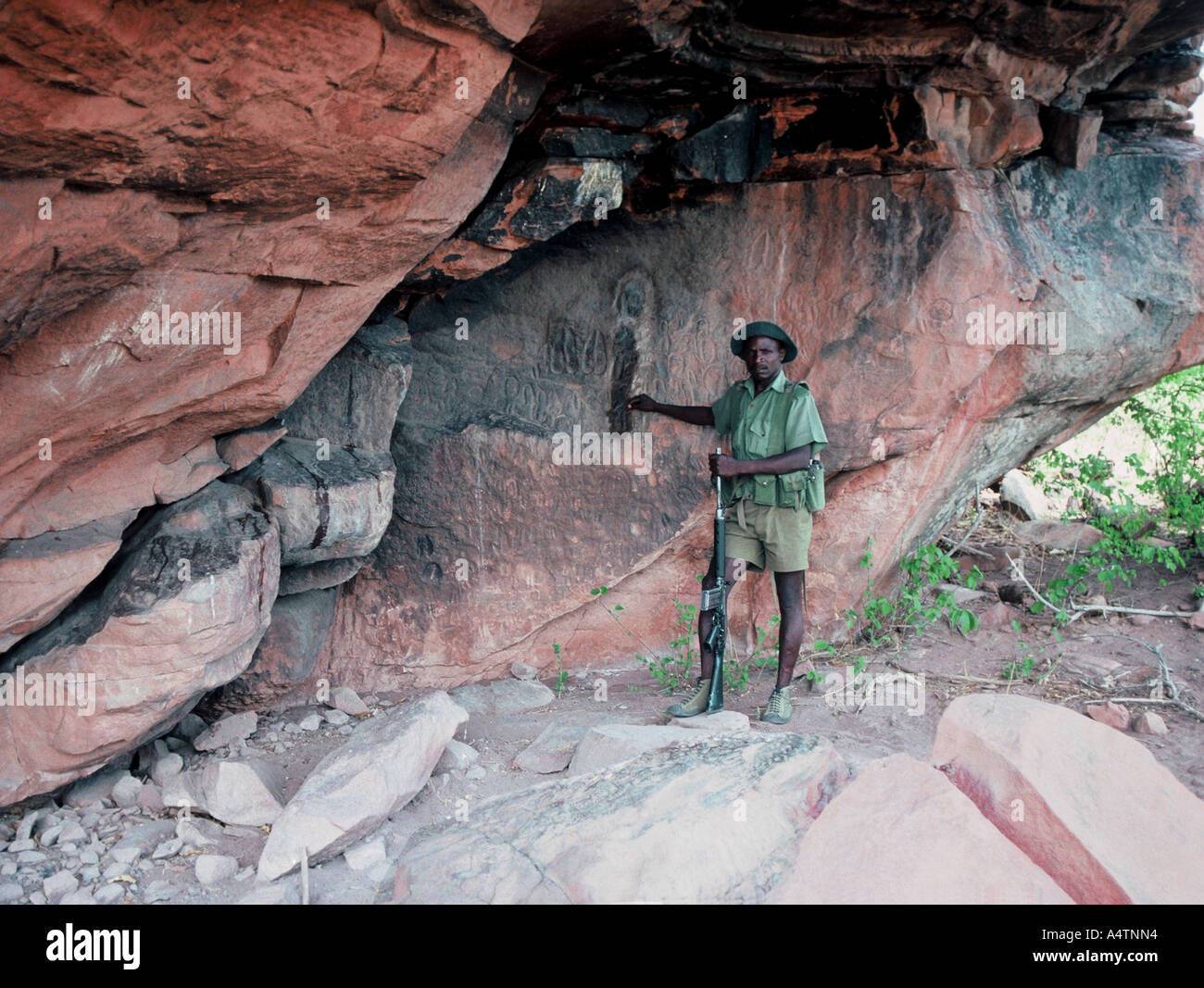 Ancient San rock shelter with pictographs Stock Photo