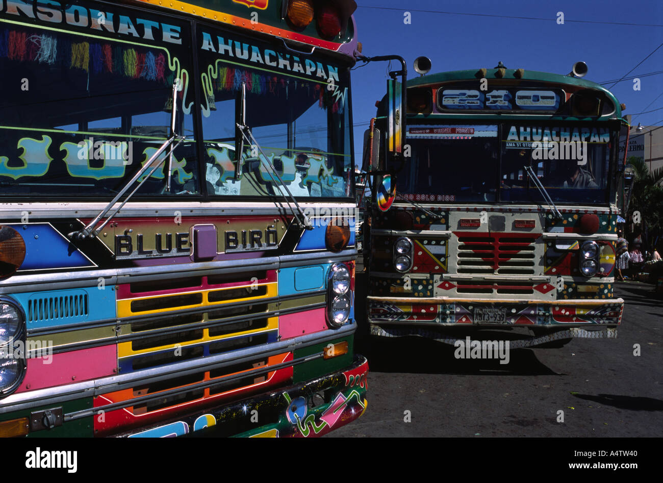 Brightly painted buses in Ahuachapan in El Salvador Central America Stock Photo