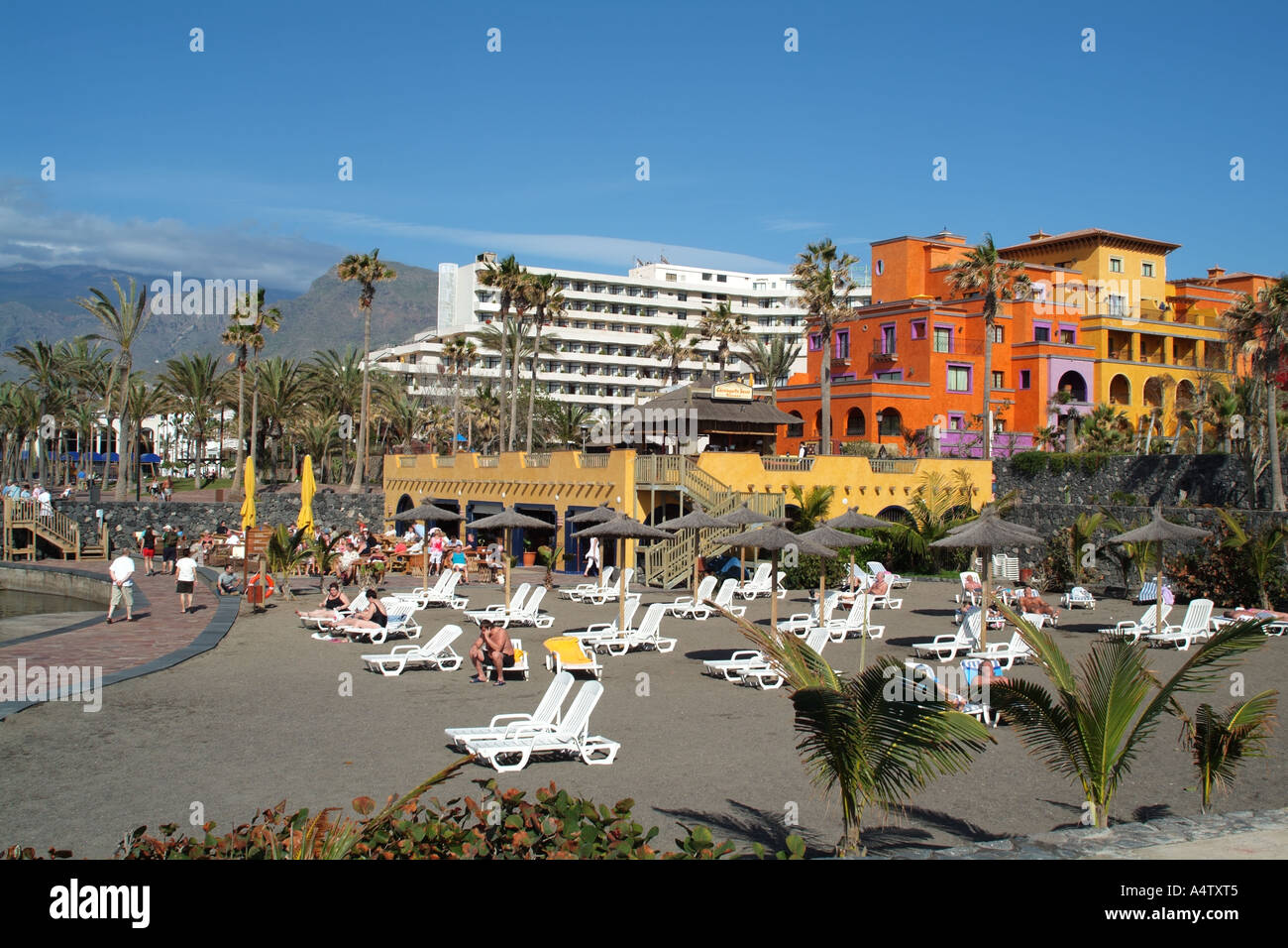 Beach and colourful promenade at Playa de Las Americas southern Tenerife  Canary Islands Spain Stock Photo - Alamy