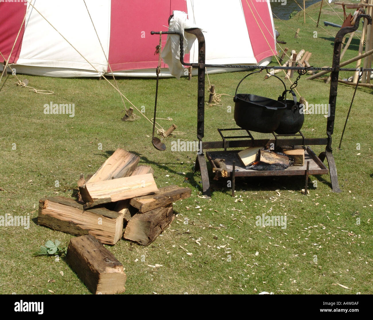 Medieval cooking equipment shown at a medieval festival South Wales Uk