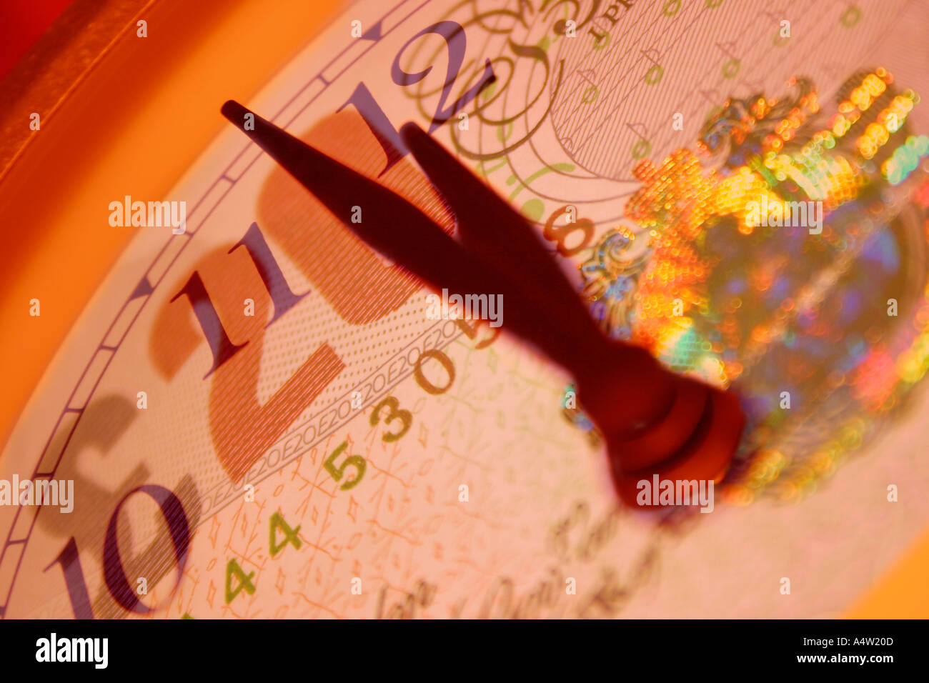 Time is Money Clock face with 20 pounds sterling note Stock Photo Alamy