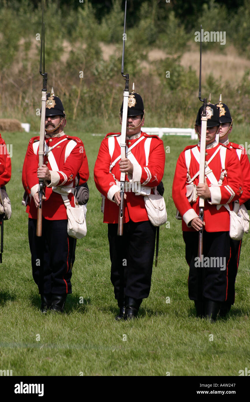 British redcoat soldiers present arms hires stock photography and