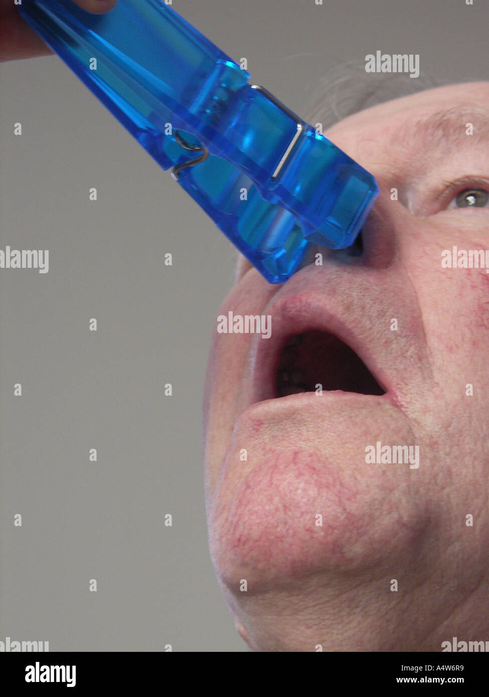 Clothespin clamping nose hires stock photography and images Alamy