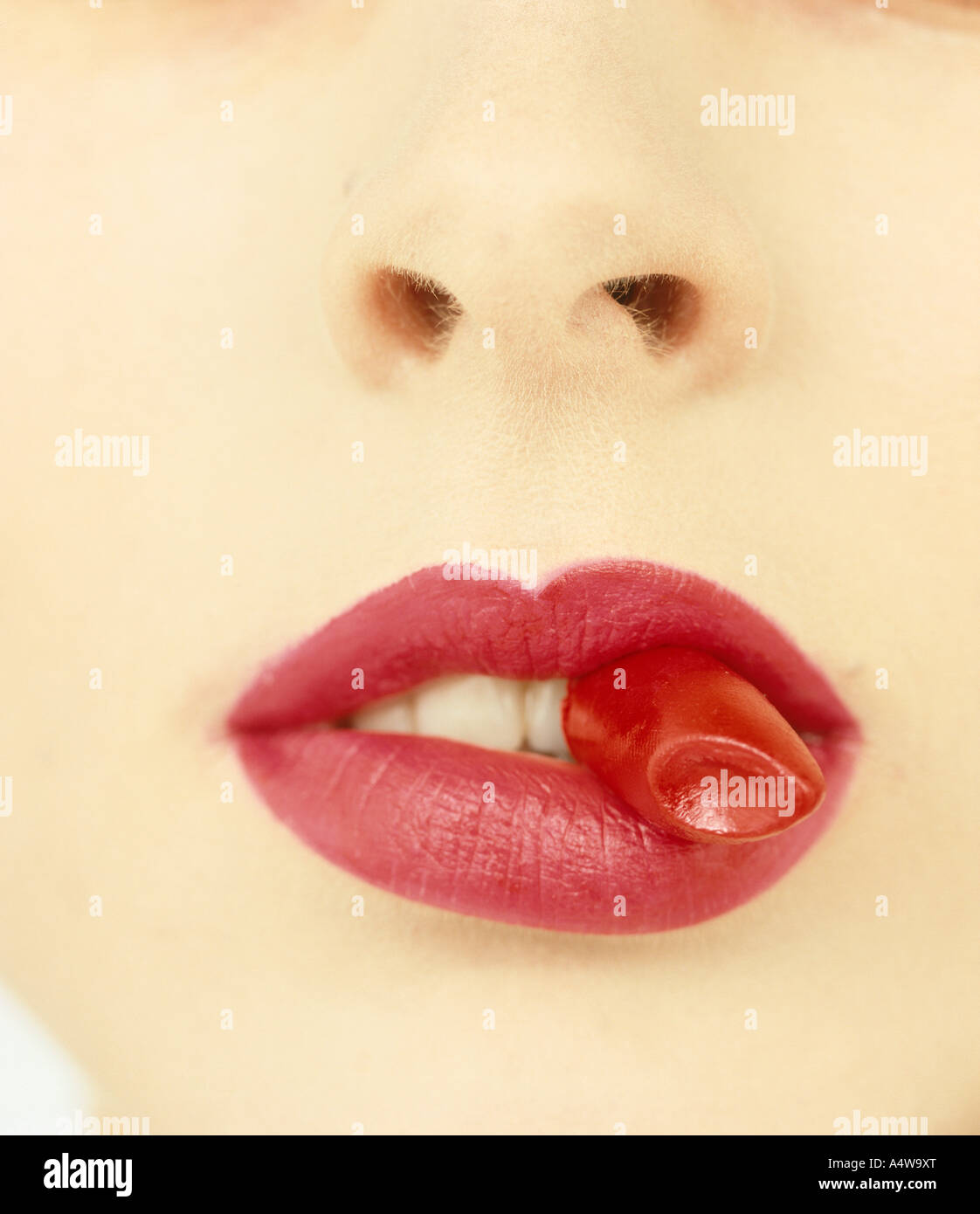 CLOSE-UP OF GIRL'S RED LIPS Stock Photo