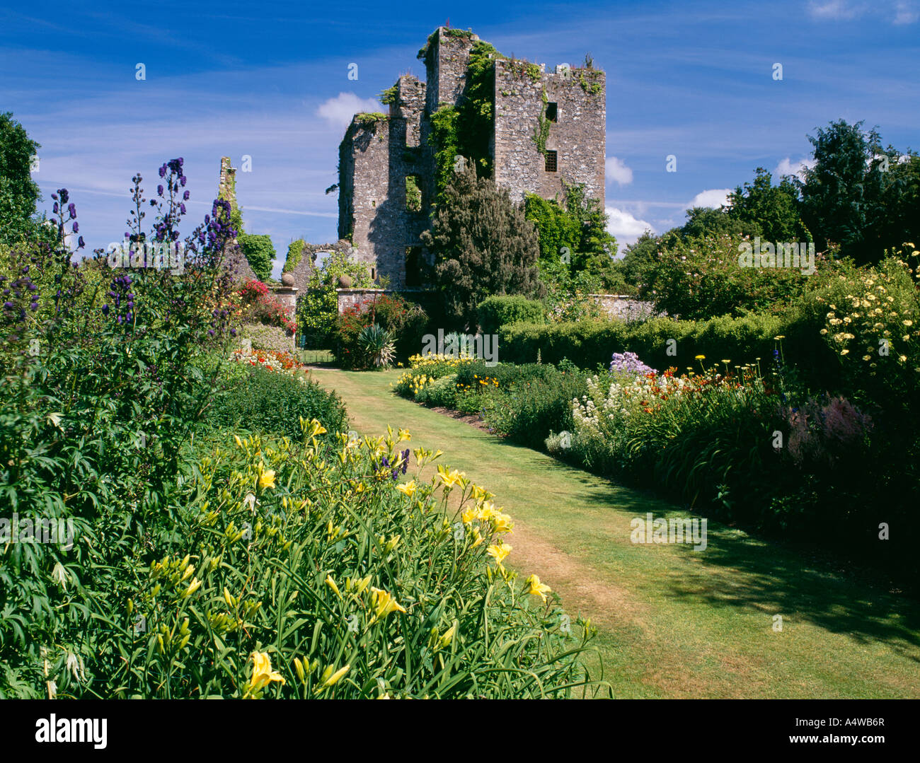 Scottish garden Castle Kennedy Gardens looking up to the ruins of Castle Kennedy near Stranraer Scotland UK Stock Photo