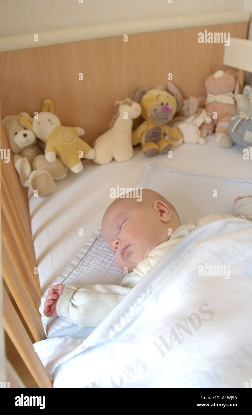 Little baby sleeping in bed Stock Photo Alamy