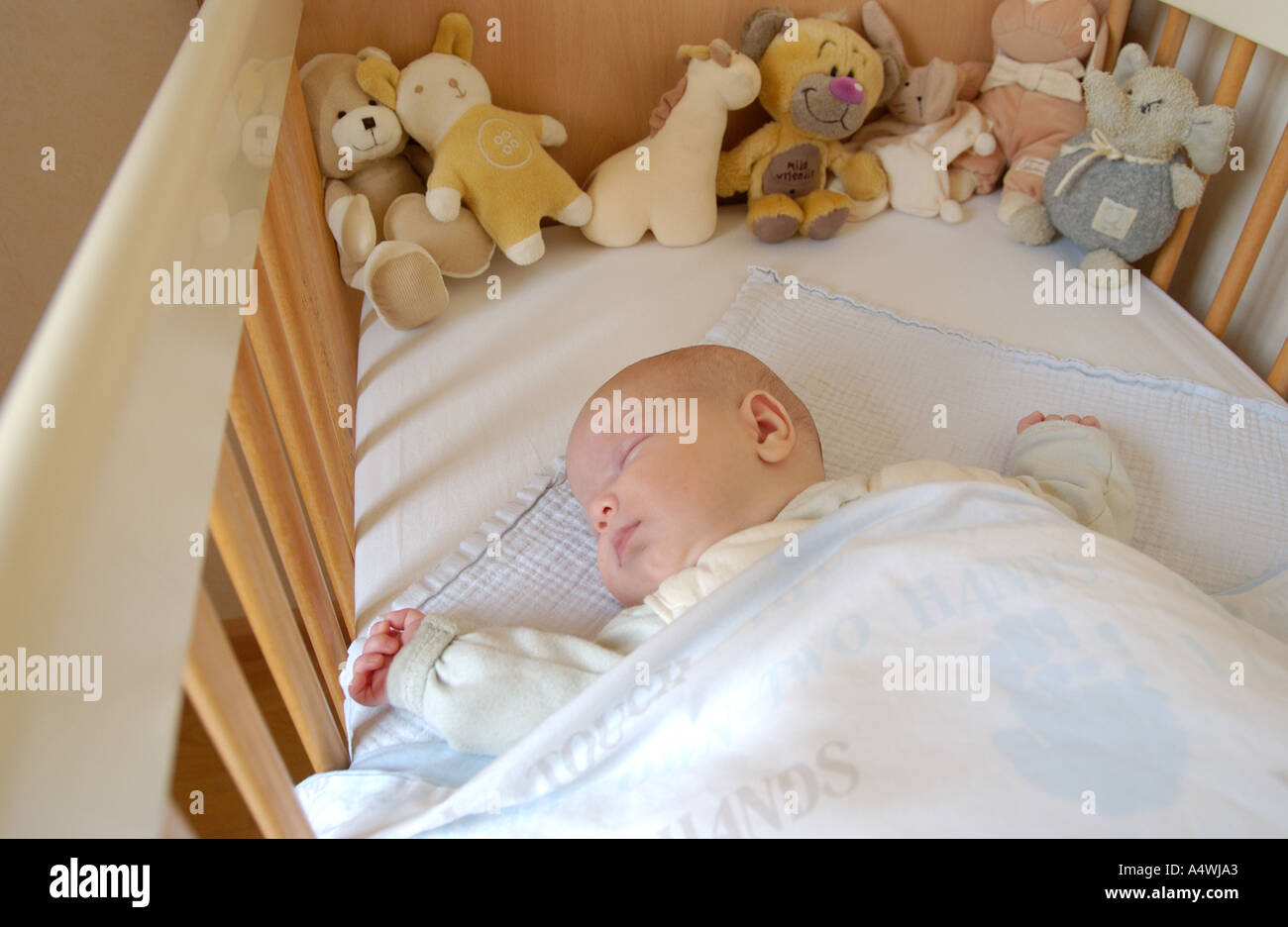 Little baby sleeping in bed Stock Photo Alamy