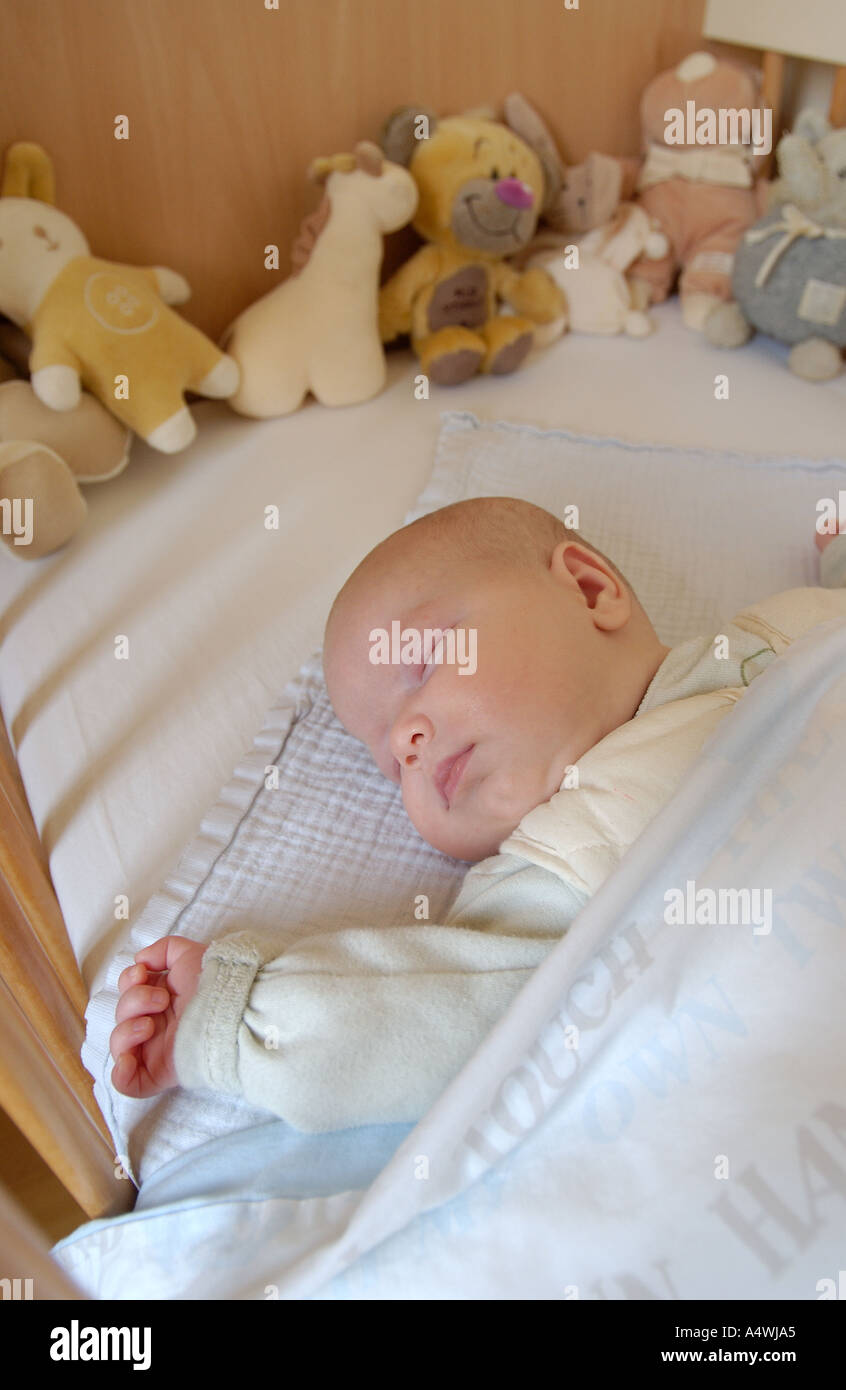 Little baby sleeping in bed Stock Photo Alamy