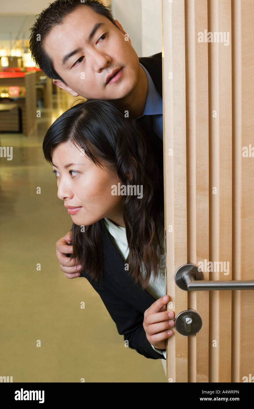 Peering around the corner hires stock photography and images Alamy