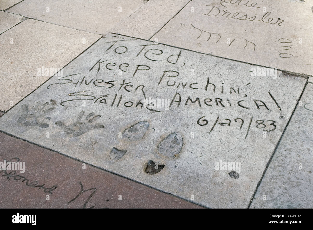 Sylvester Stallone s hand and foot prints ant Mann s Chinese Theatre Hollywood Boulevard Los Angeles California USA Stock Photo