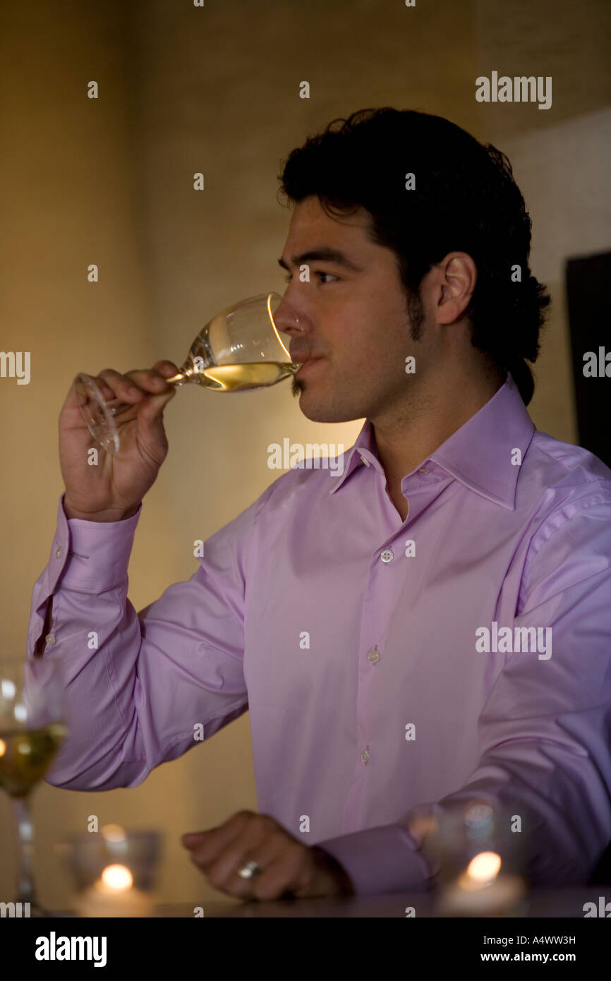 Man sipping wine Stock Photo