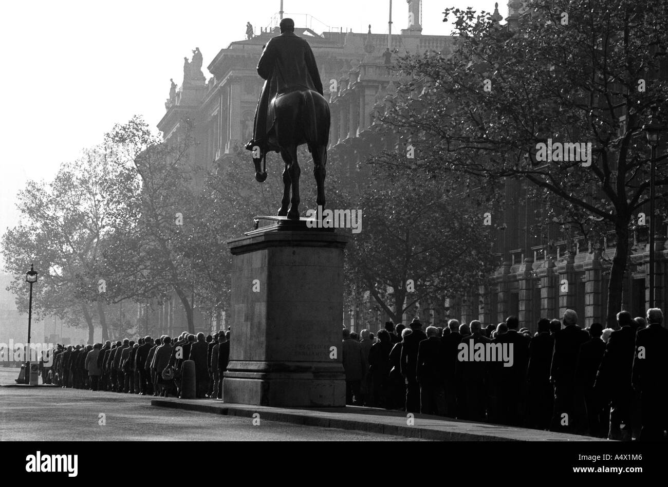 Line of veterans parade in Whitehall London on Remembrance day Stock