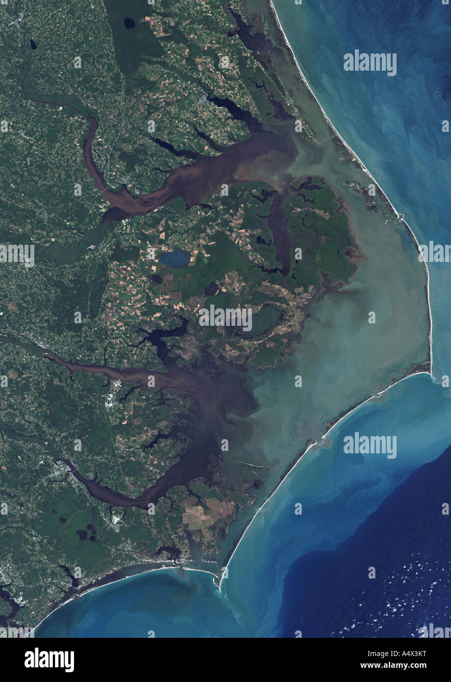 The sea innundates coastal areas of North Carolina Flood damage as seen from orbit 1999 Enhanced version of a NASA original Stock Photo