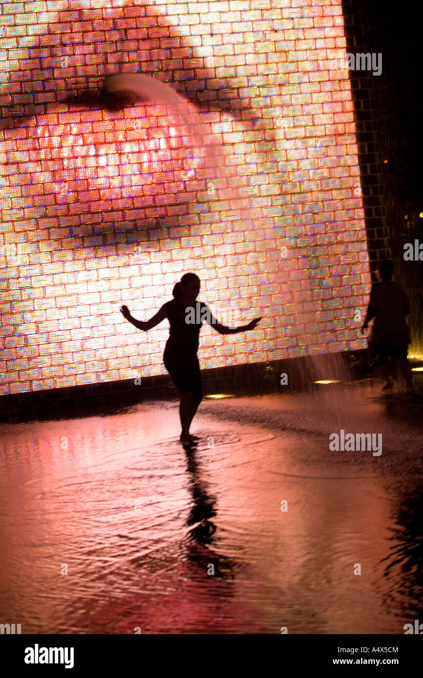 Kids playing in the water at Crown Fountain in Millennium Park Chicago Illinois Stock Photo