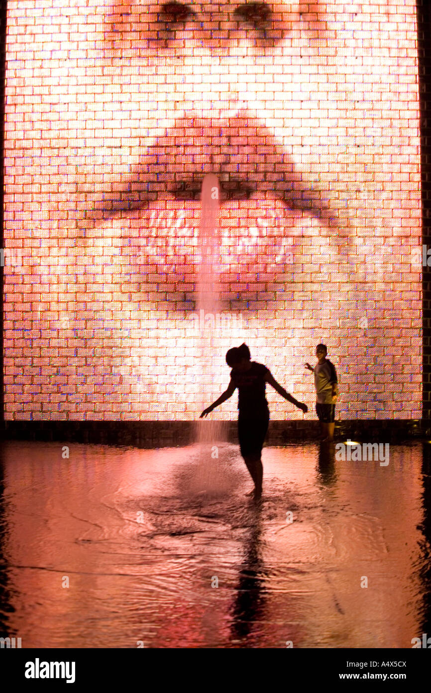 Kids playing in the water at Crown Fountain in Millennium Park Chicago Illinois Stock Photo
