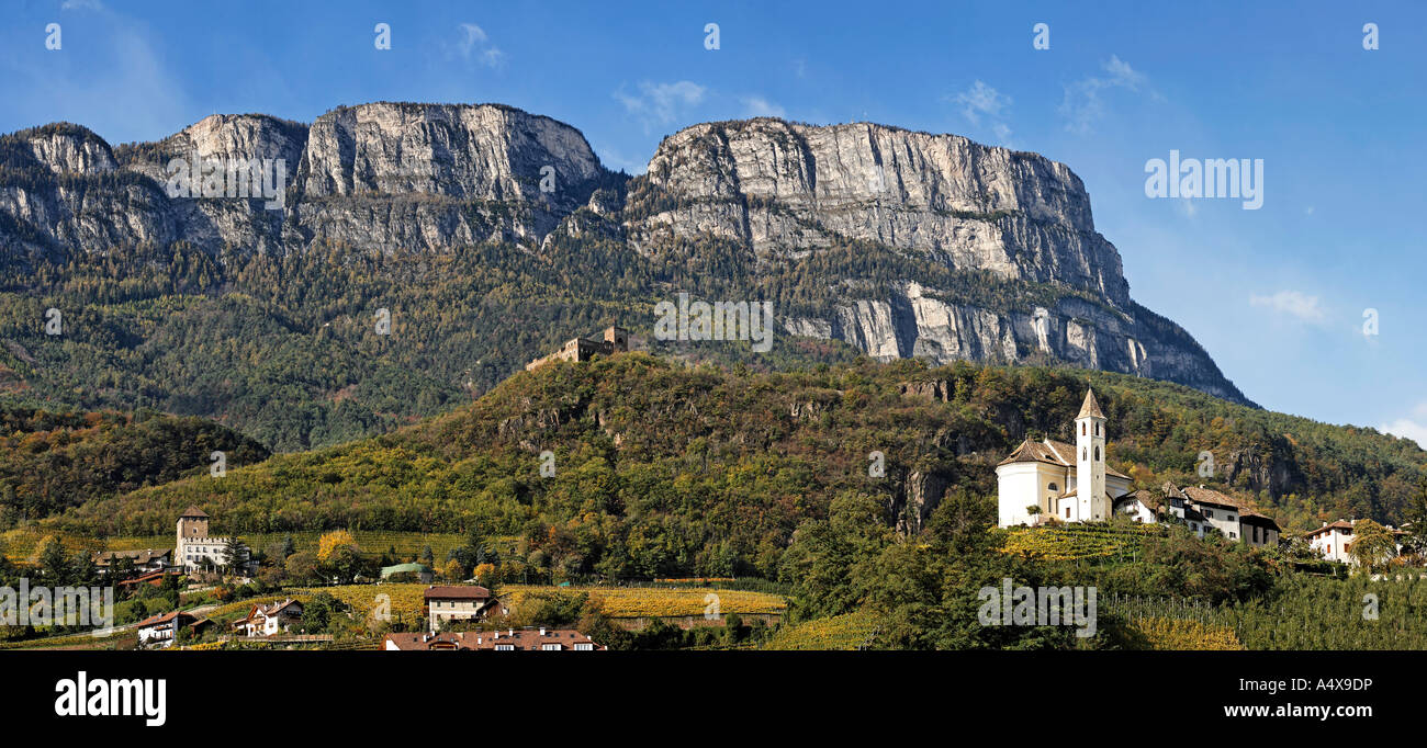Village of Missian with church behind the mountain Gantkofel, near