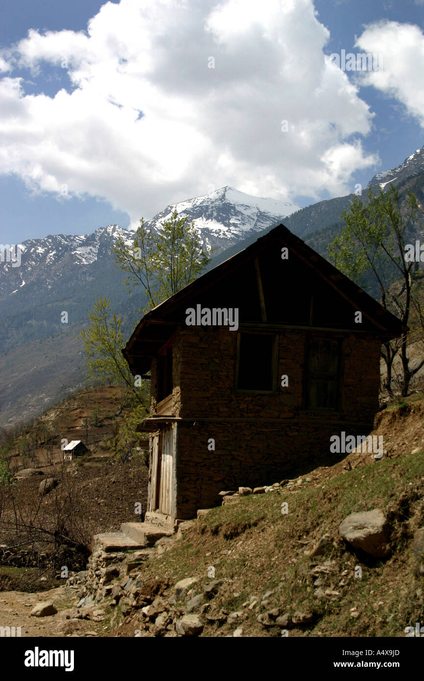COTTAGE ON HILLS Stock Photo