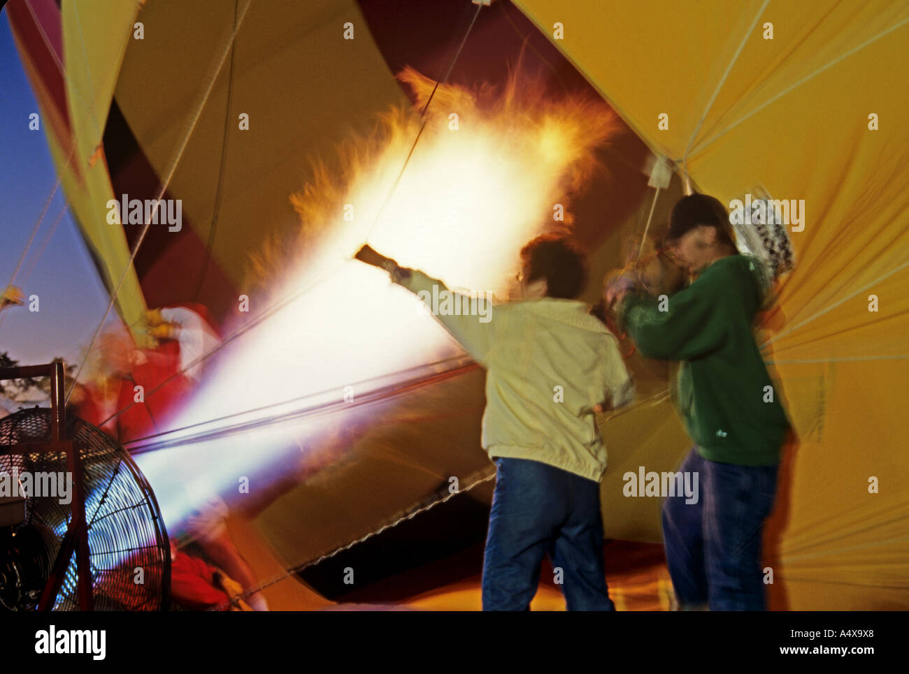 Blowing a balloon hi-res stock photography and images - Alamy