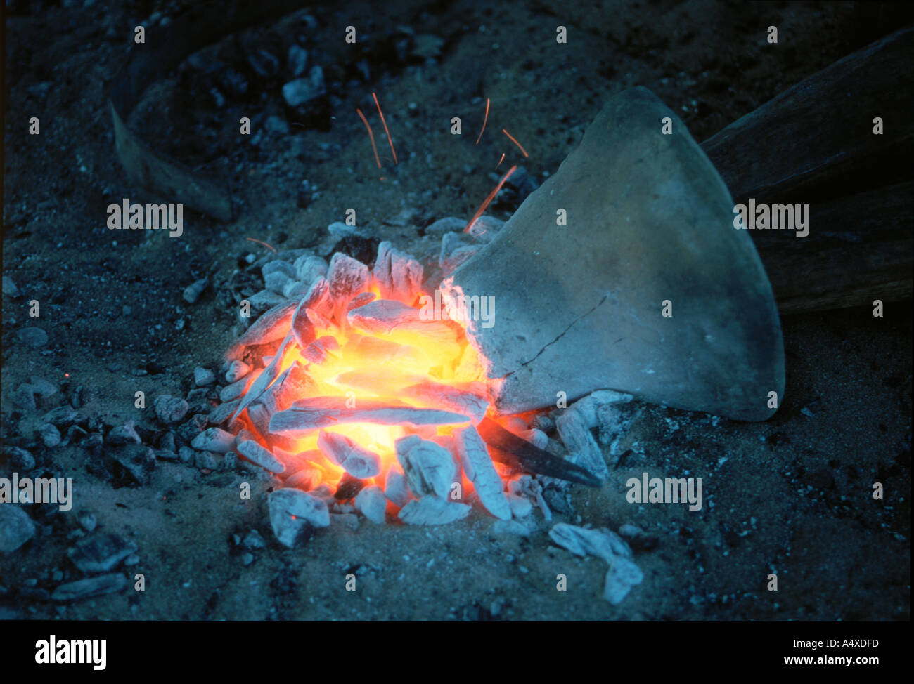 Hot fire with bellows for working iron Stock Photo