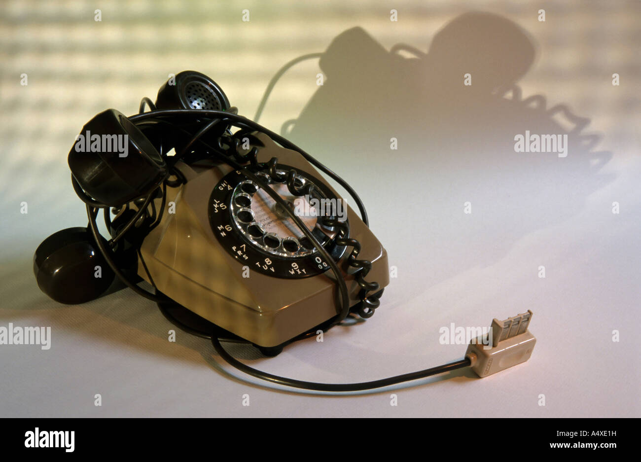 Cables tangling up an obsolete phone Stock Photo Alamy
