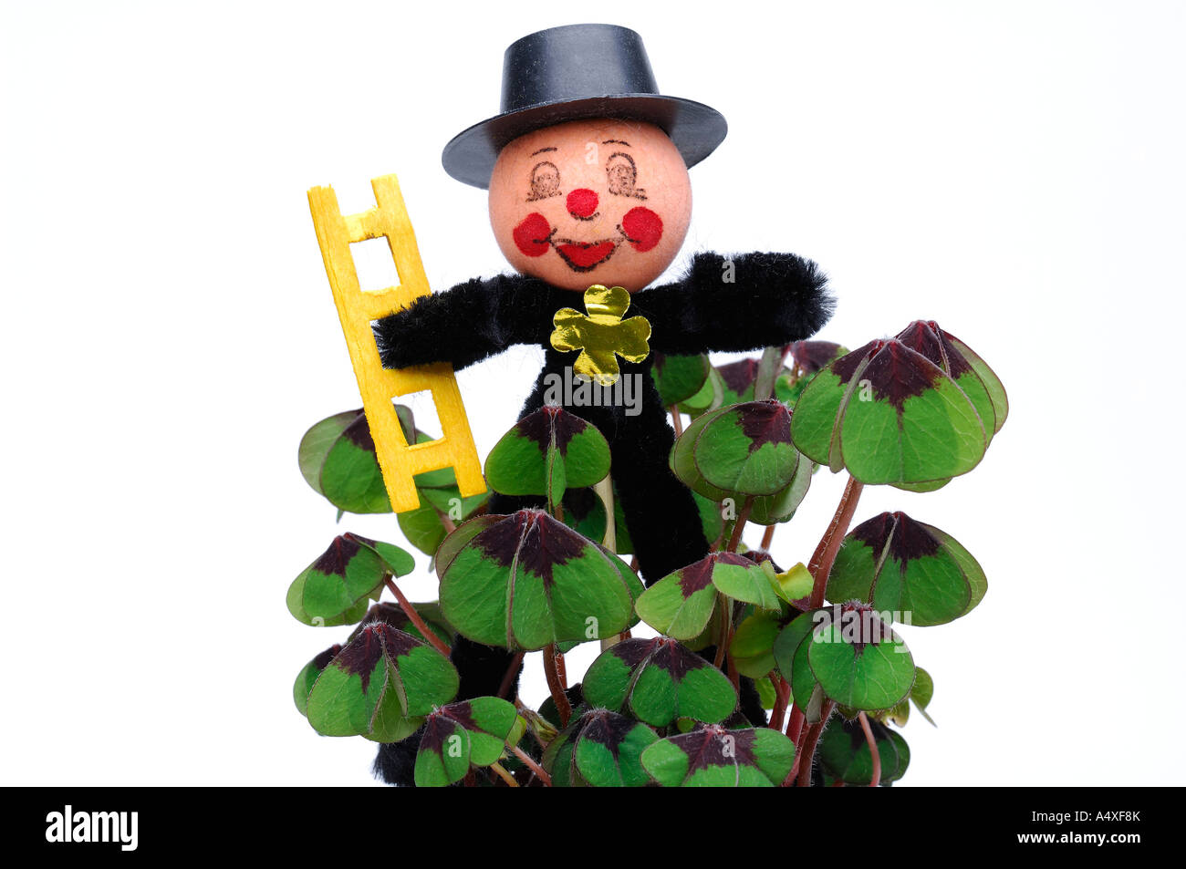 chimney sweep as a good luck charm with clovers Stock Photo