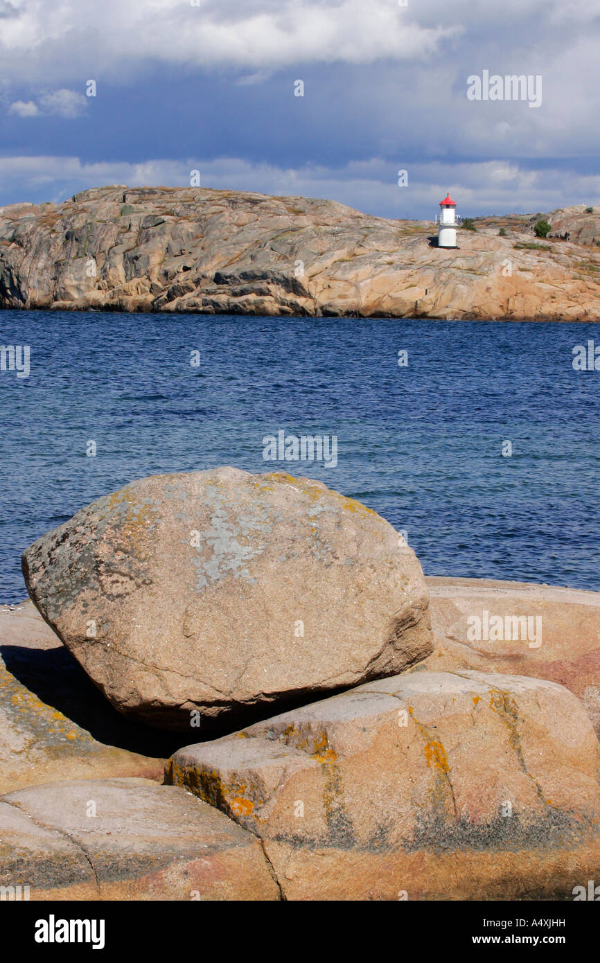 Little lighthouse at the swedish Baltic Sea coast with granite rocks ...