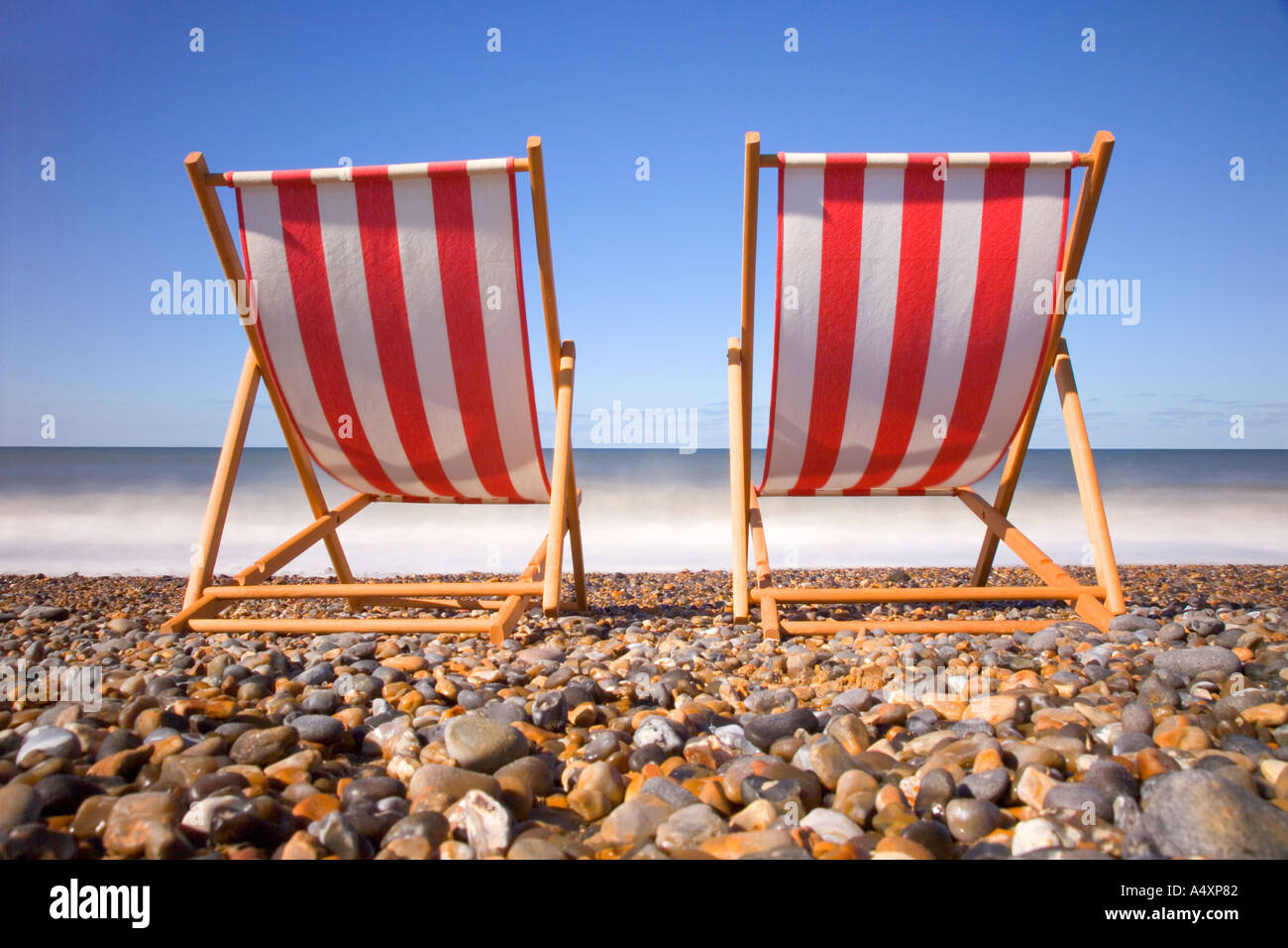 deck chairs on beach image