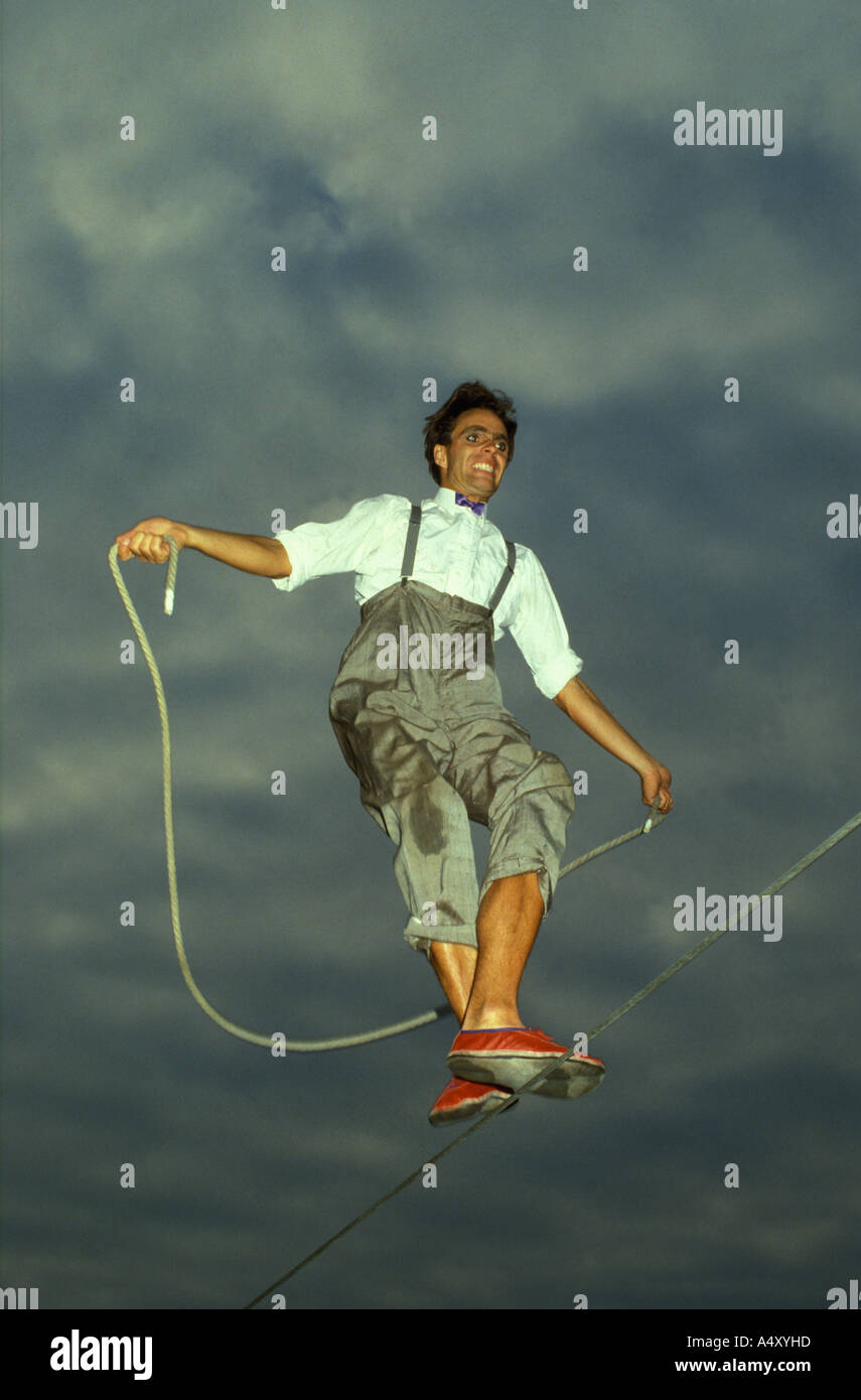 Rope dancer. Skipping. Man jumping with a rope on a rope Stock Photo