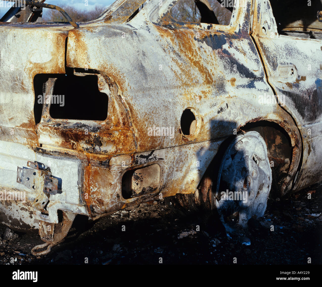 Abandoned Car Scrap metal burnt out wreck Stock Photo