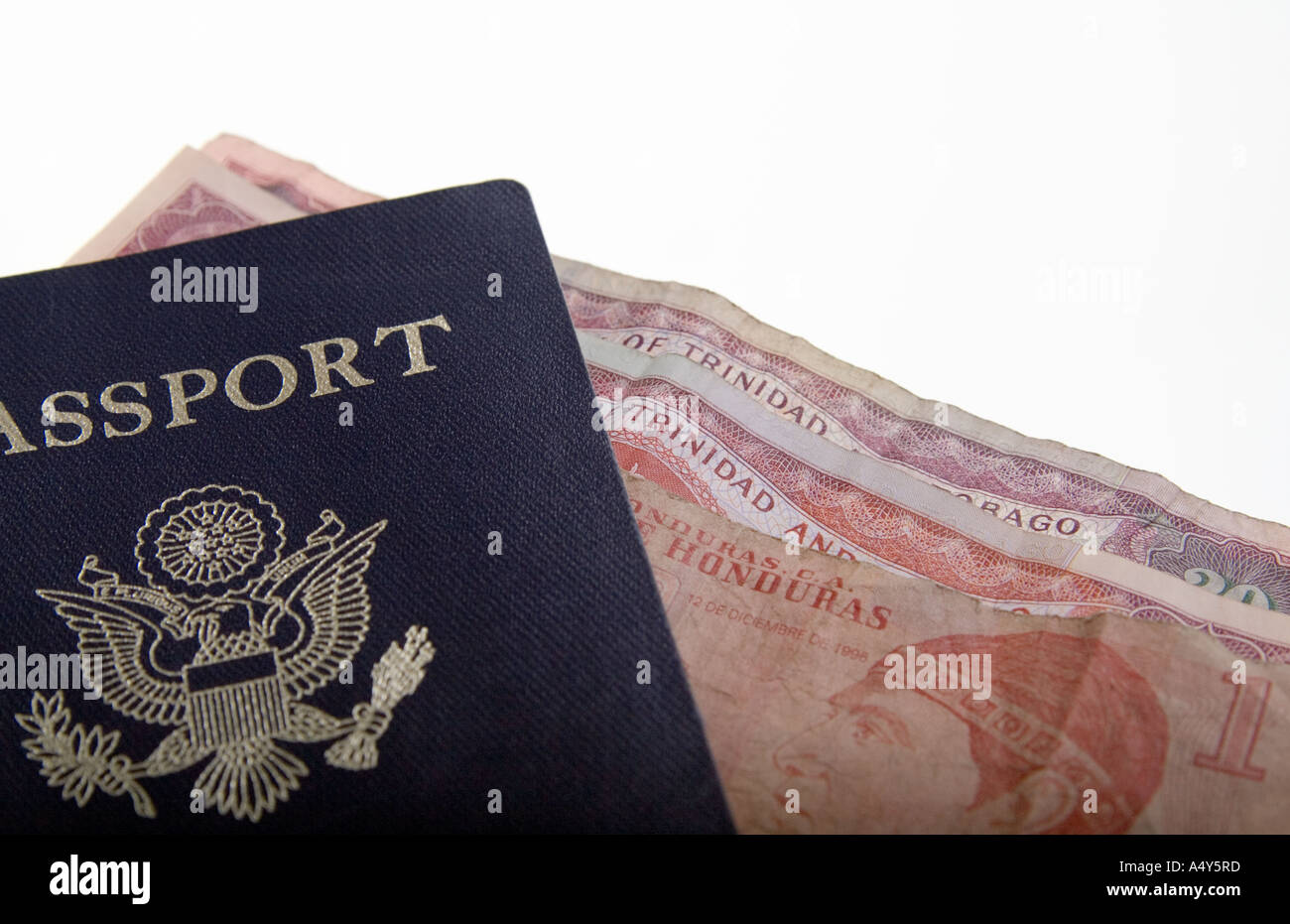 Passport with Trinidad and Honduras currency Stock Photo Alamy