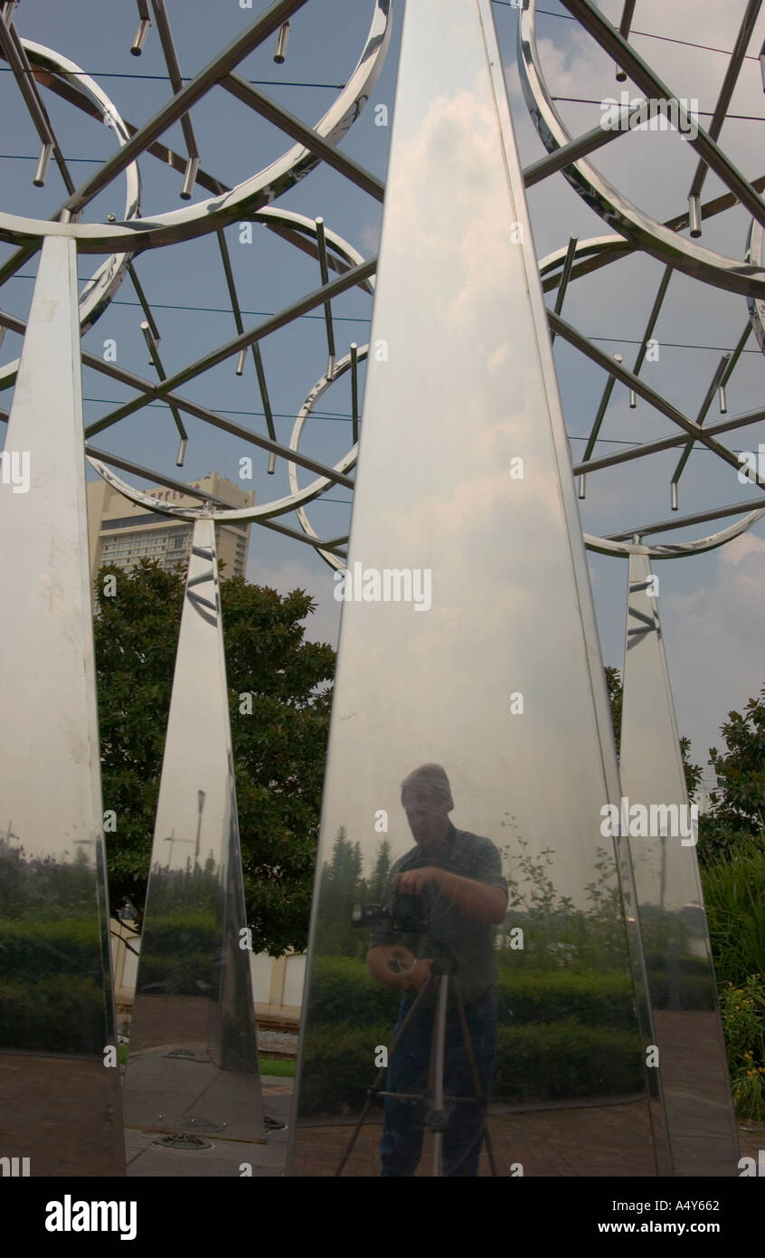 Reflection of photographer in metal art design New Orleans LA USA Stock Photo