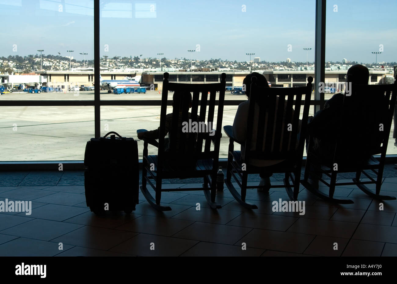 Family Waits In San Airport Rocking Chairs San Diego Ca Usa Stock