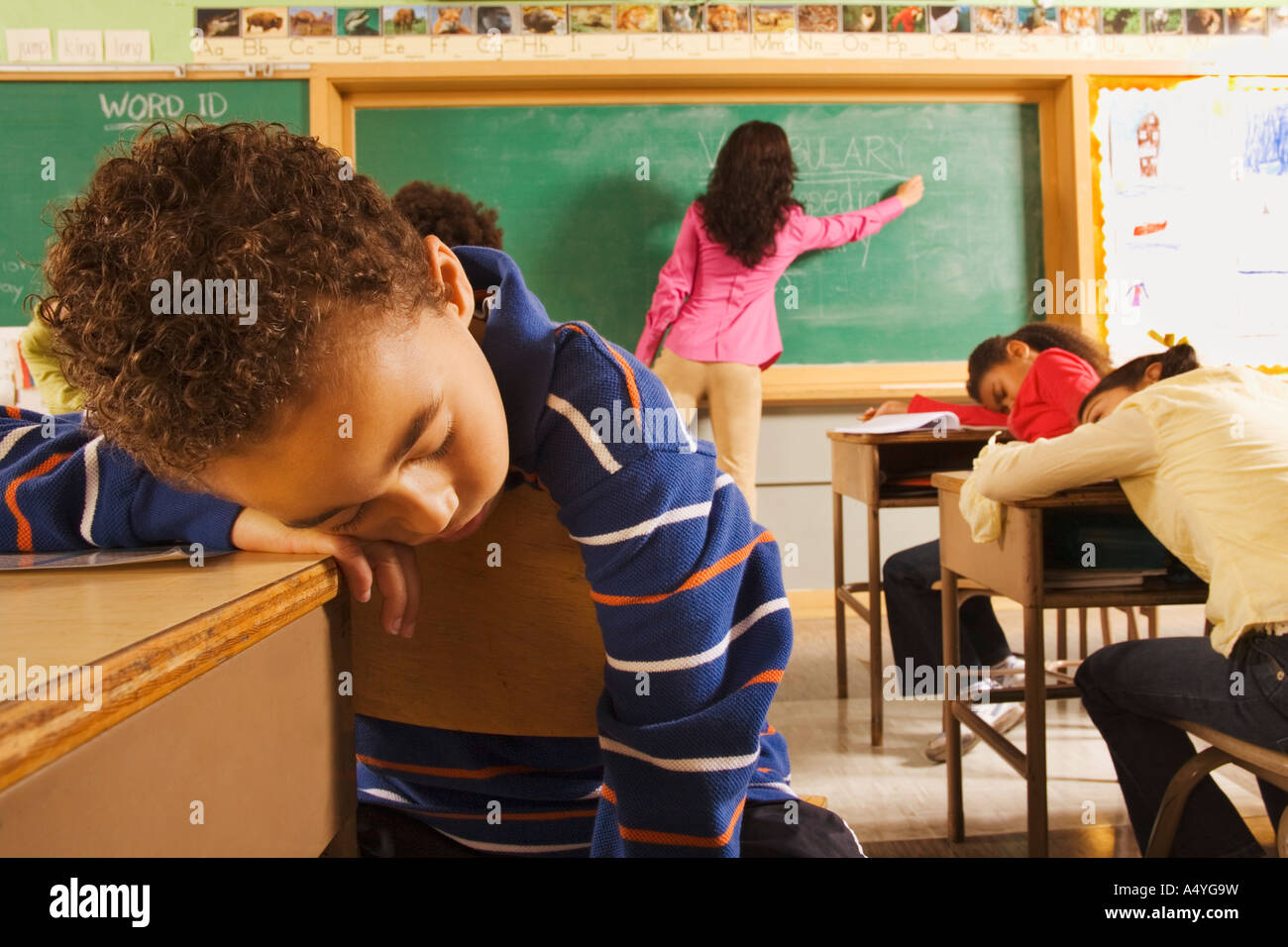 Teacher Writing On Blackboard High Resolution Stock Photography And Images Alamy