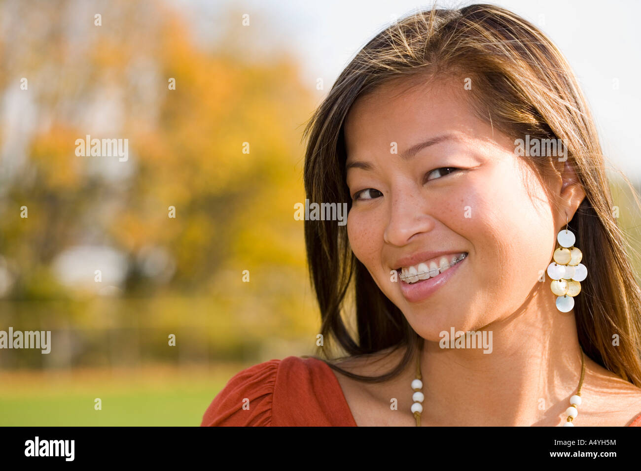 Smiling asian woman portrait braces hi-res stock photography and images ...