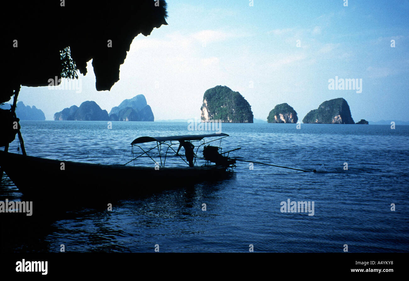 Strange rocks beach boat Stock Photo - Alamy