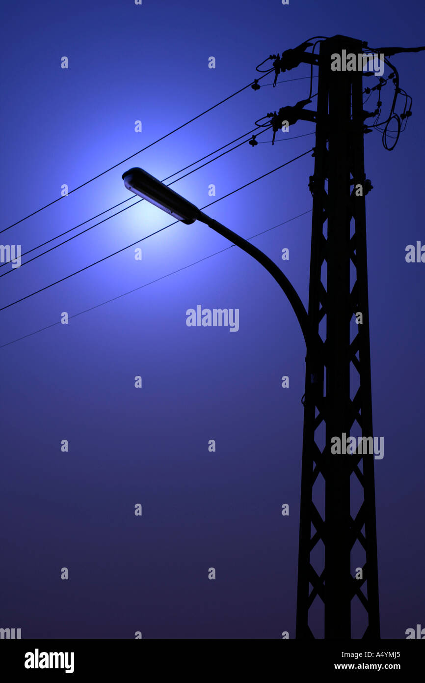 Power supply pylon in moonlight Stock Photo Alamy