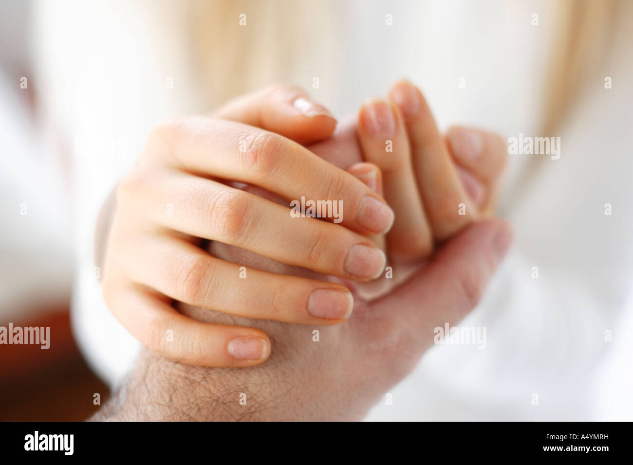 touching hands Stock Photo