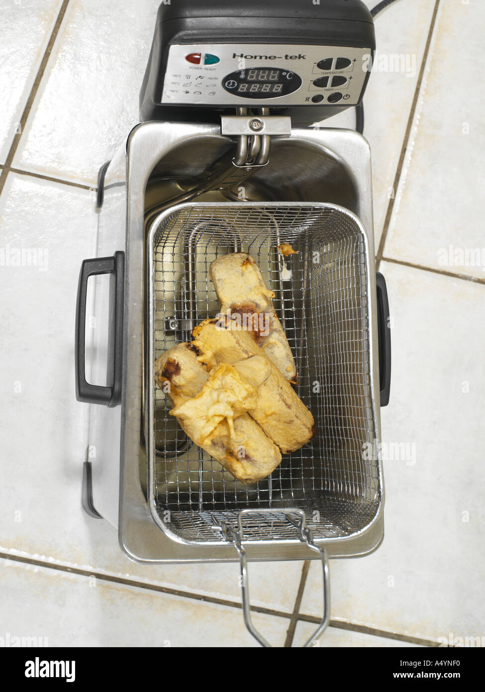 Deep Fried Mars Bar in Deep Fryer Basket Stock Photo Alamy