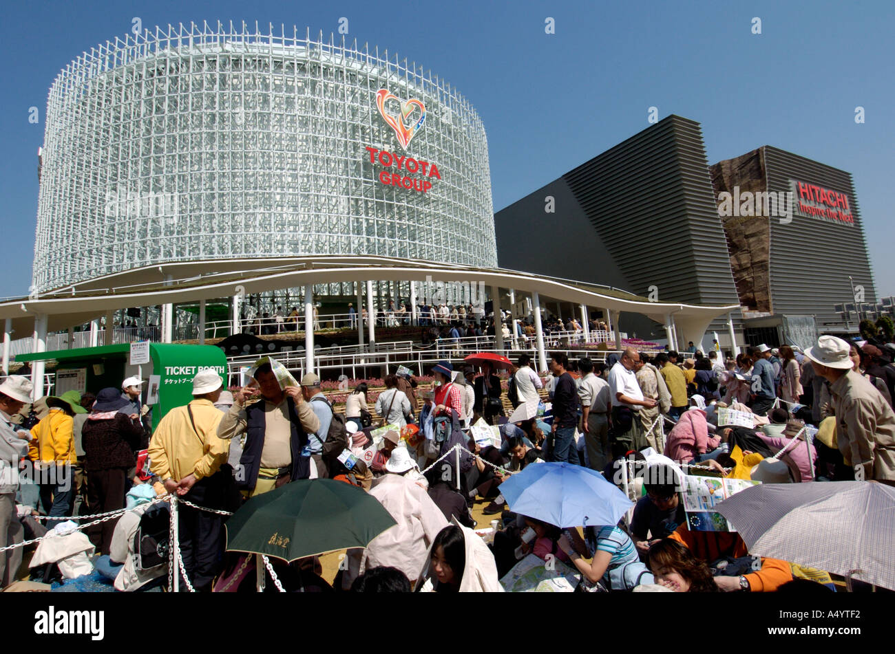 Crowds of visitors wait to enter the huge Toyota Pavilion at the World ...