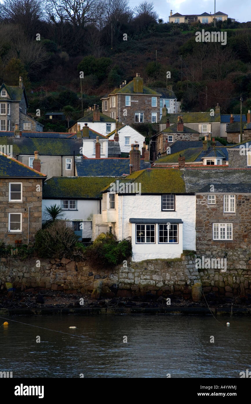 mousehole houses over the harbour cornwall Stock Photo Alamy