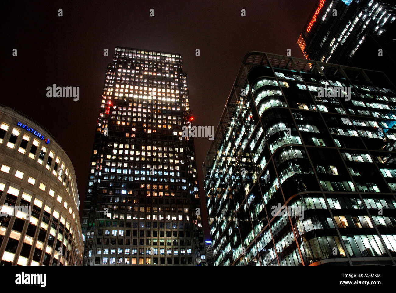 Canary Wharf buildings at night in Docklands London Stock Photo - Alamy
