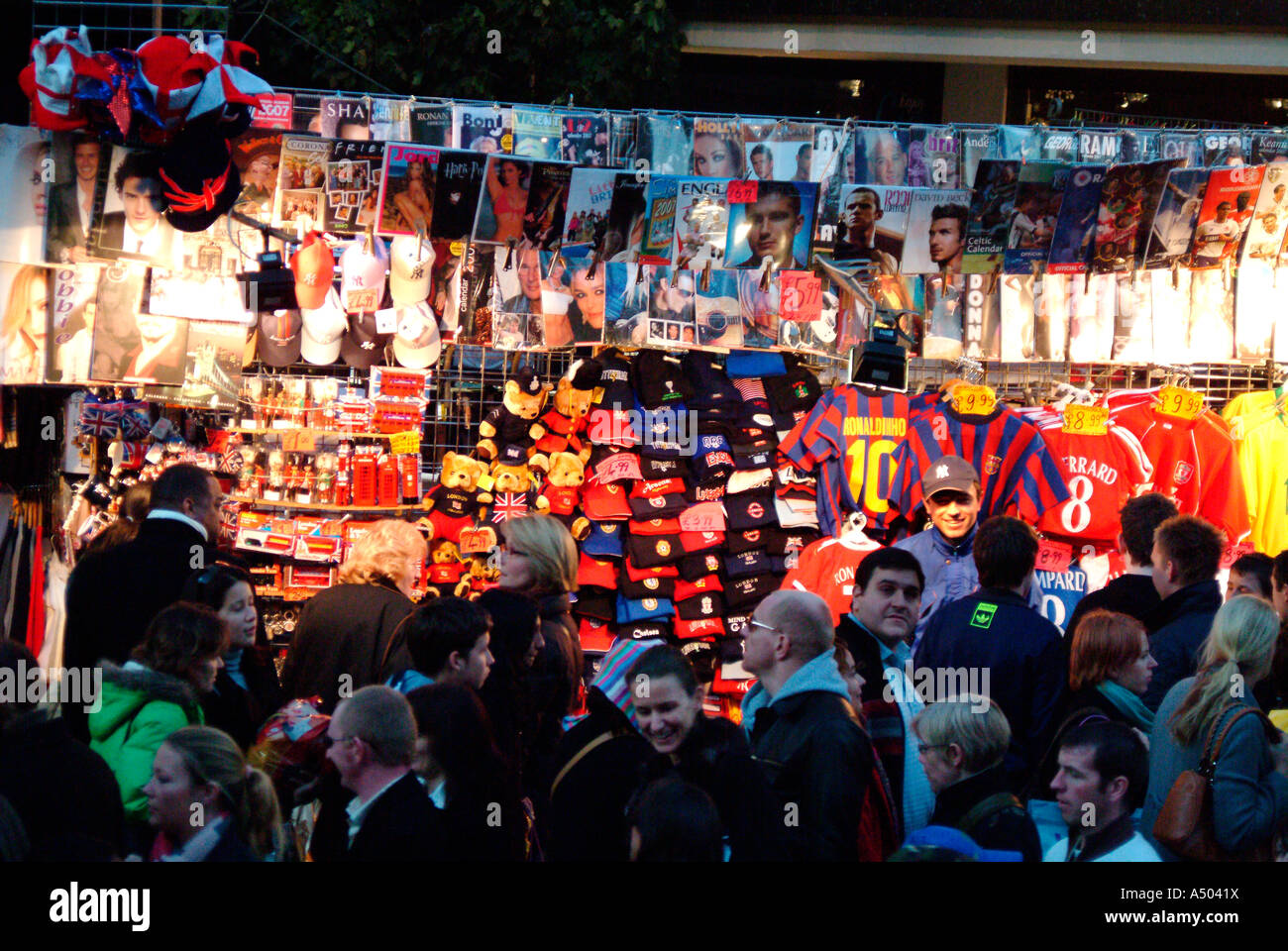 Football shirts and merchandise on an Oxford Street stall London Stock