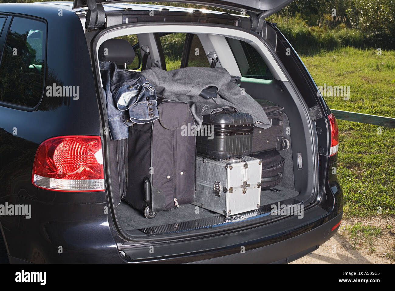 Luggage in a car boot Stock Photo