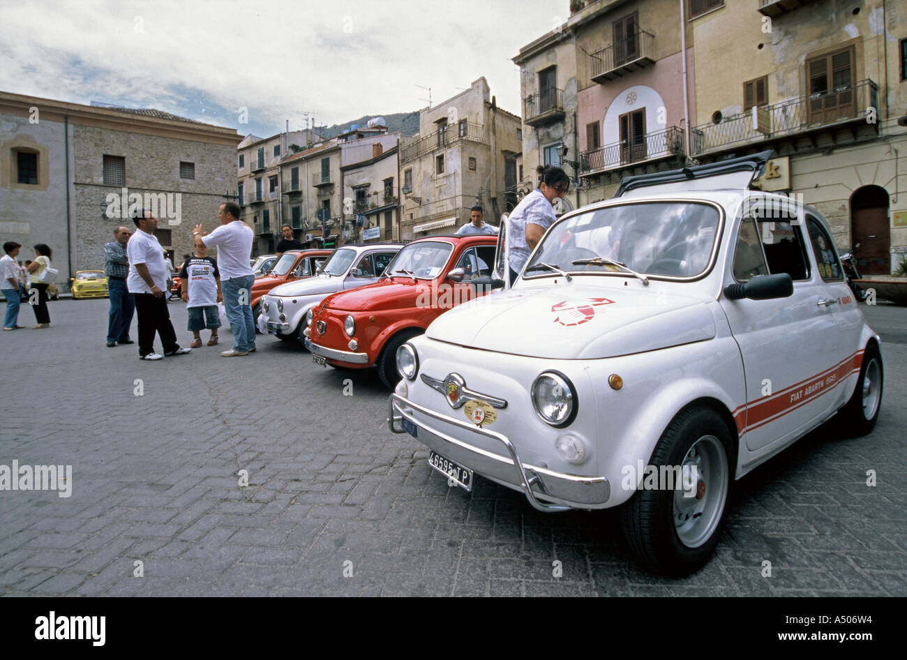 Italy, Palermo Province, Sicily, Monreale - Fiat 500 cars parked in front of  Monreale Cathedral during a Fiat 500 rally Stock Photo