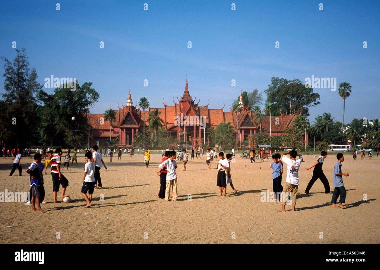 Jan 26, 2003 - Young Cambodian men playing soccer on a sand pitch at the National Museum in Phnom Penh Stock Photo