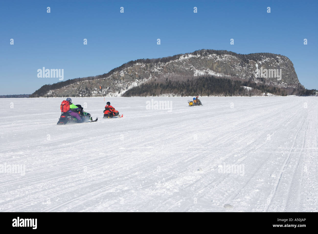 Snowmobiling on Moosehead Lake in Rockwood Maine Mount Kineo is in the