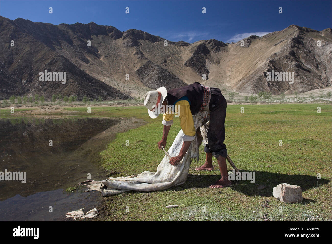 Leather working, Junpa, Tibet Stock Photo